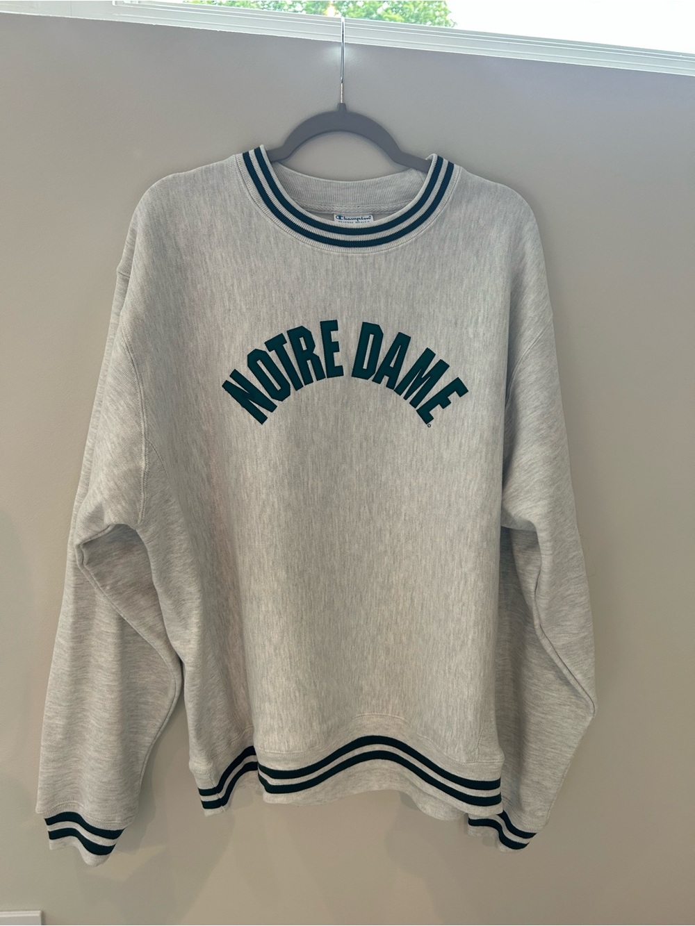 Champion Light Gray Crewneck Sweatshirt with Green Lettering